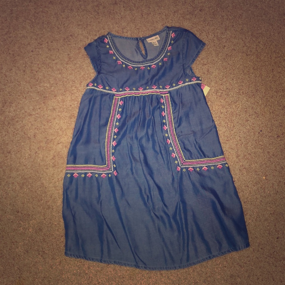 This is a dress that was never worn